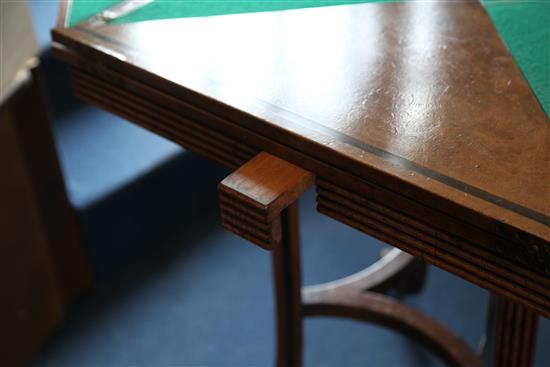 A pair of ebony strung burr walnut envelope card tables, W.1ft 11in. D.1ft 11in. H.2ft 5in.